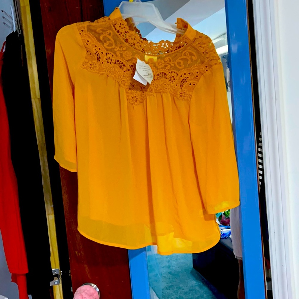 Yellow blouse.
